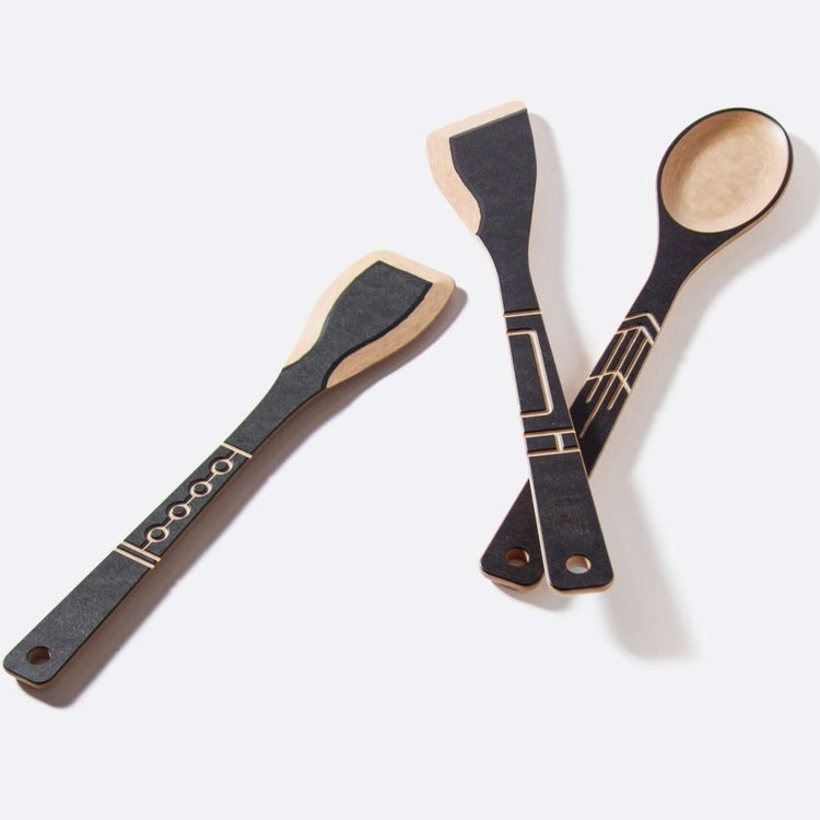 The Frank Lloyd Wright Utensil Set includes the Large Spoon, Paddle and Sauté Tool in Slate/Natural