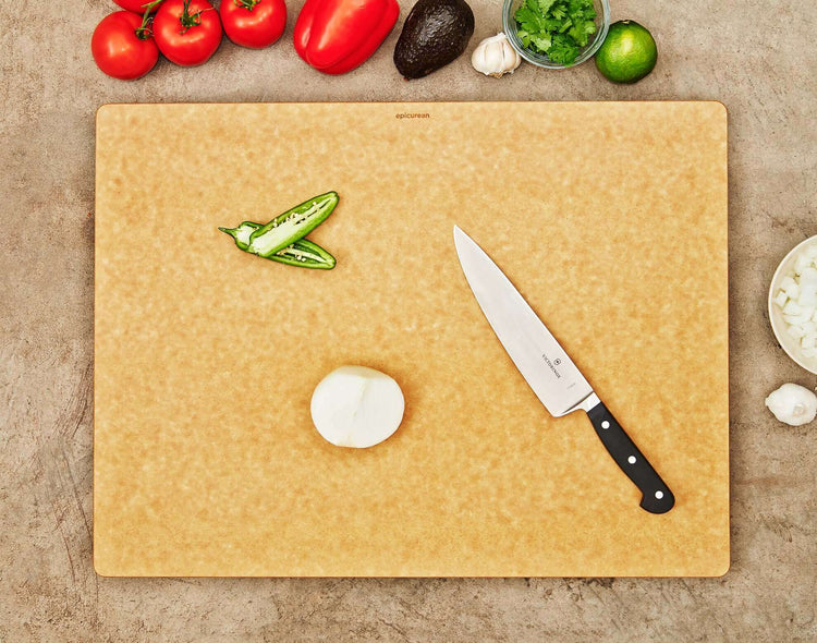 The Big Block Board in Natural with a Slate Cascade being used to slice fresh produce.