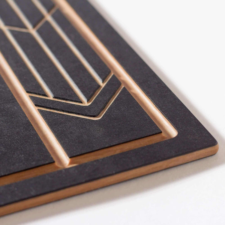 The Frank Lloyd Wright Medium Cut and Serve Board close up detail in Slate/Natural